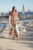 Animal printed Long Kaftan with stone work on the neckline by KAPRICE